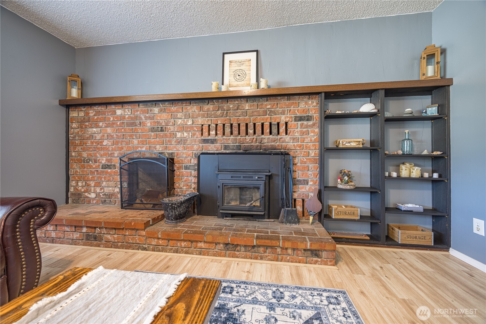 642 Kitchen-Dick Road Sequim, WA 98382 - Photo 9 of 40 a living room with furniture and a fireplace