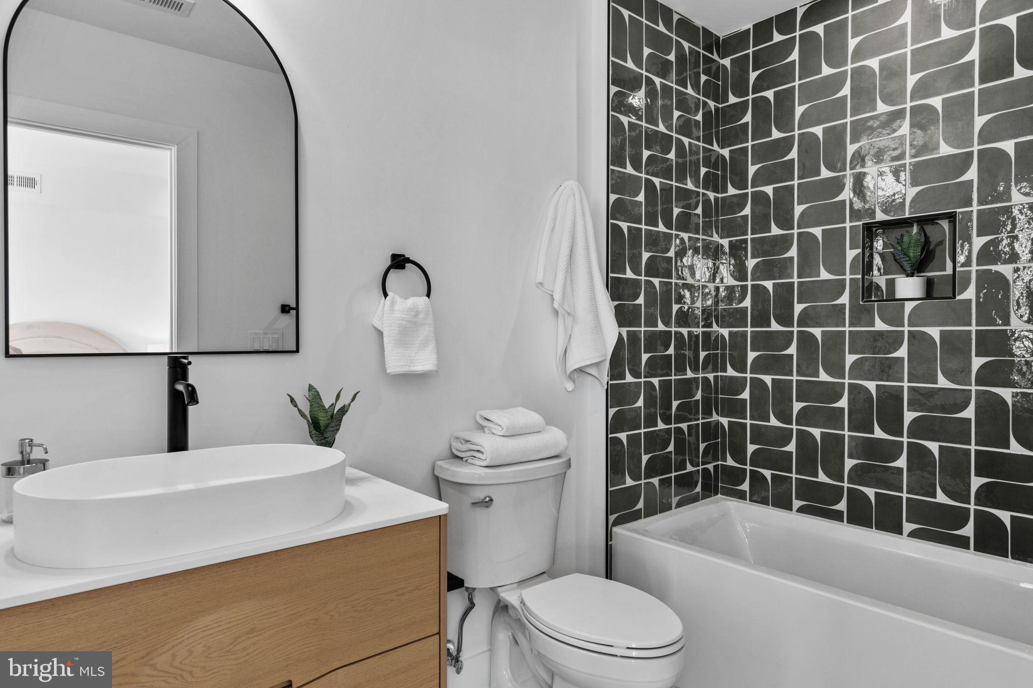 749 North Capitol Street Philadelphia, PA 19130 - Photo 36 of 61 Sleek bathroom with modern tile accents.