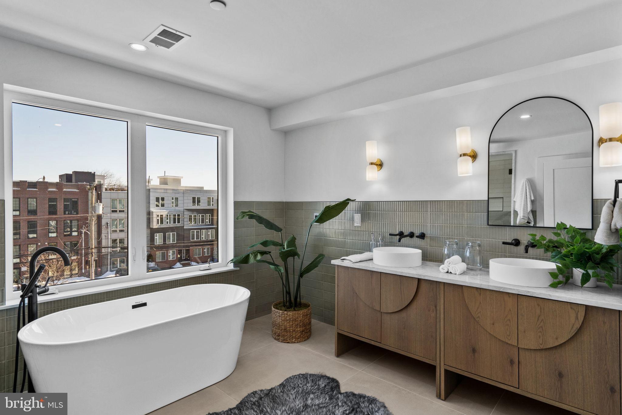 749 North Capitol Street Philadelphia, PA 19130 - Photo 48 of 61 Modern bathroom with city skyline views.
