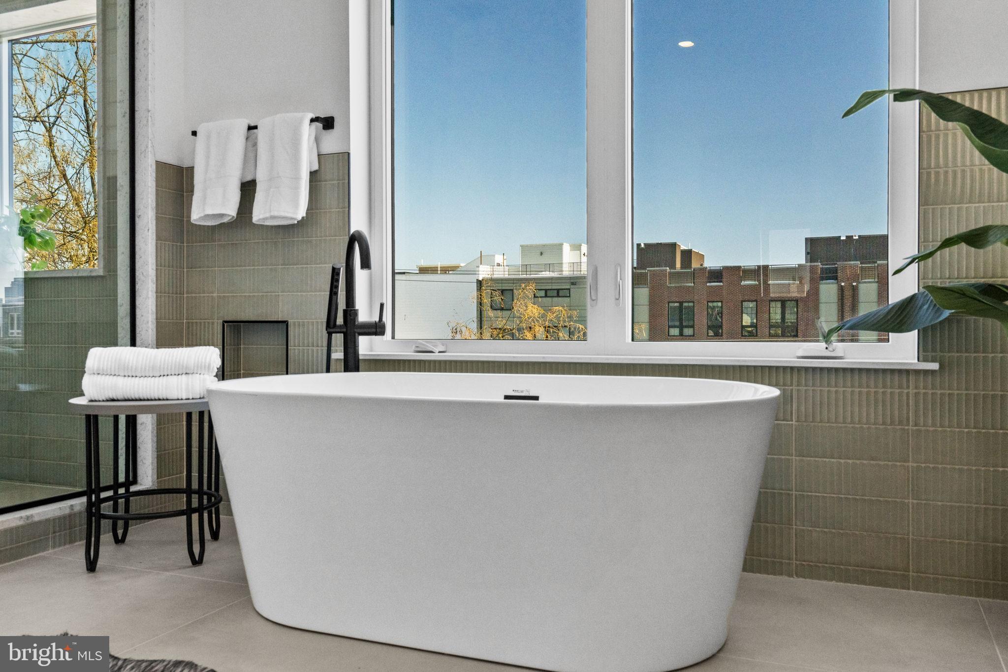 749 North Capitol Street Philadelphia, PA 19130 - Photo 49 of 61 Serene bathroom with cityscape views.