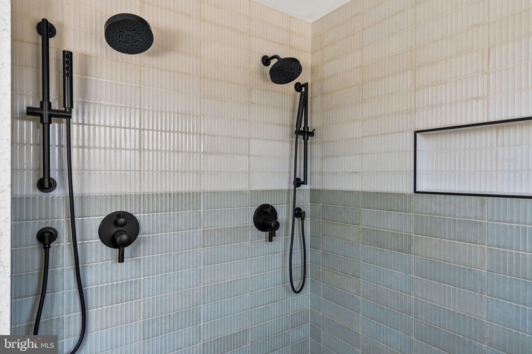 749 North Capitol Street Philadelphia, PA 19130 - Photo 51 of 61 Sleek black fixtures in a modern shower.