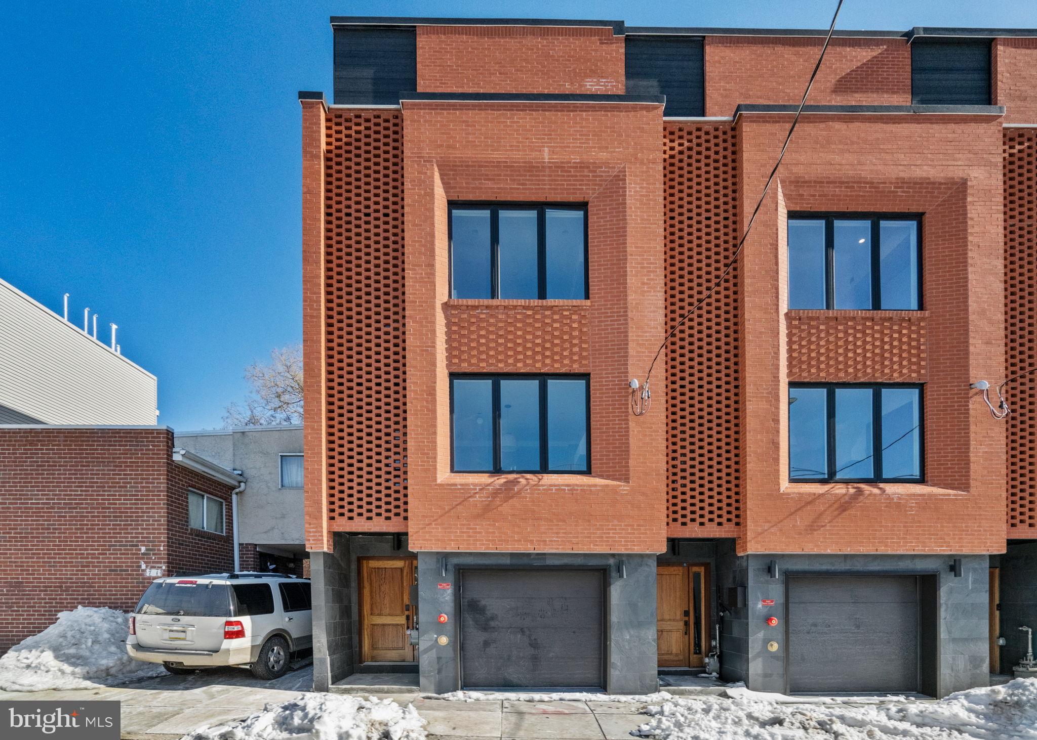 749 North Capitol Street Philadelphia, PA 19130 - Photo 61 of 61 Modern townhouse with striking brick facade.