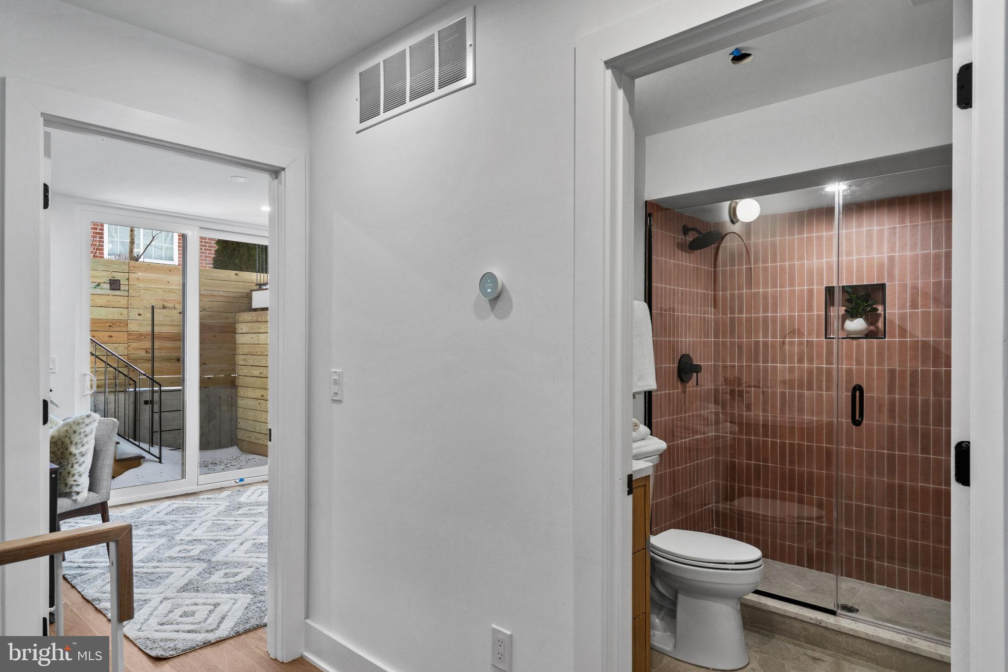 749 North Capitol Street Philadelphia, PA 19130 - Photo 7 of 61 Modern hallway with stylish bathroom access.