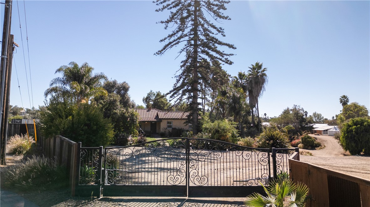 1955 Friendly Drive Vista, CA 92084 - Photo 14 of 75 a view of a house with a tree in the background