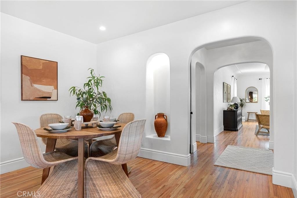 1955 Friendly Drive Vista, CA 92084 - Photo 20 of 75 a dining room with furniture and wooden floor