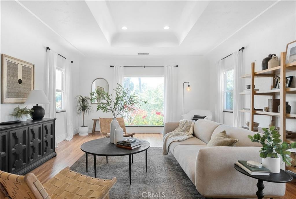 1955 Friendly Drive Vista, CA 92084 - Photo 21 of 75 a living room with furniture potted plant and a window
