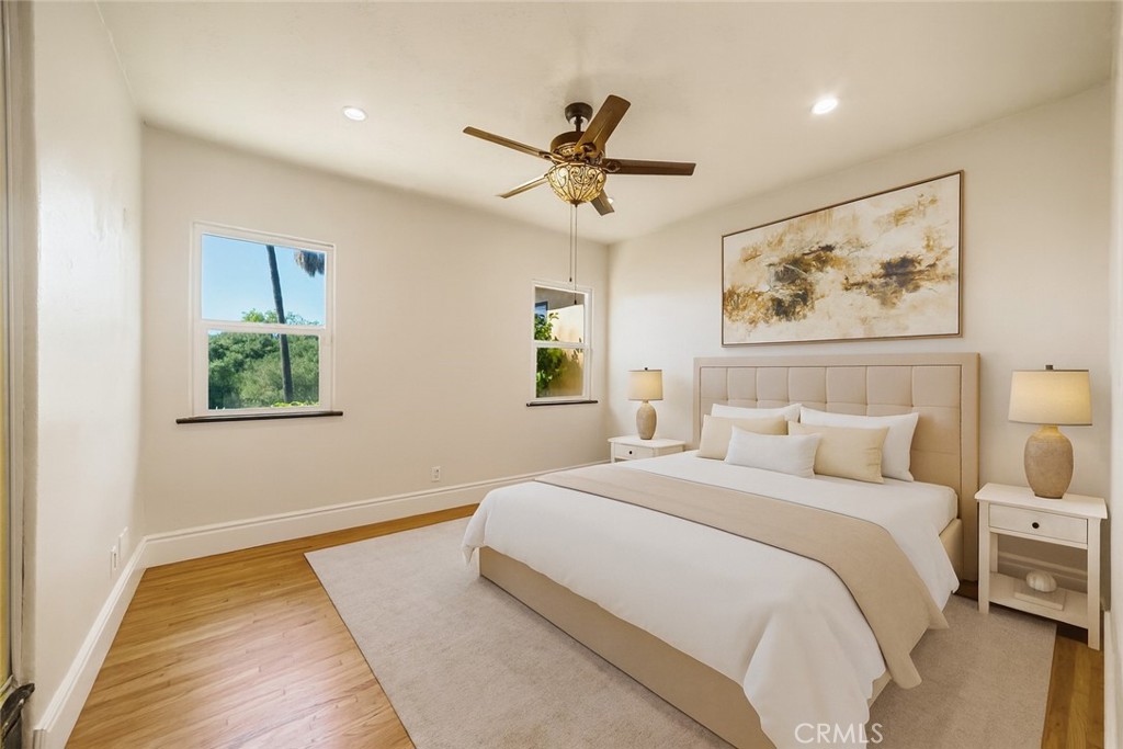 1955 Friendly Drive Vista, CA 92084 - Photo 26 of 75 a bedroom with a bed and a painting on the wall