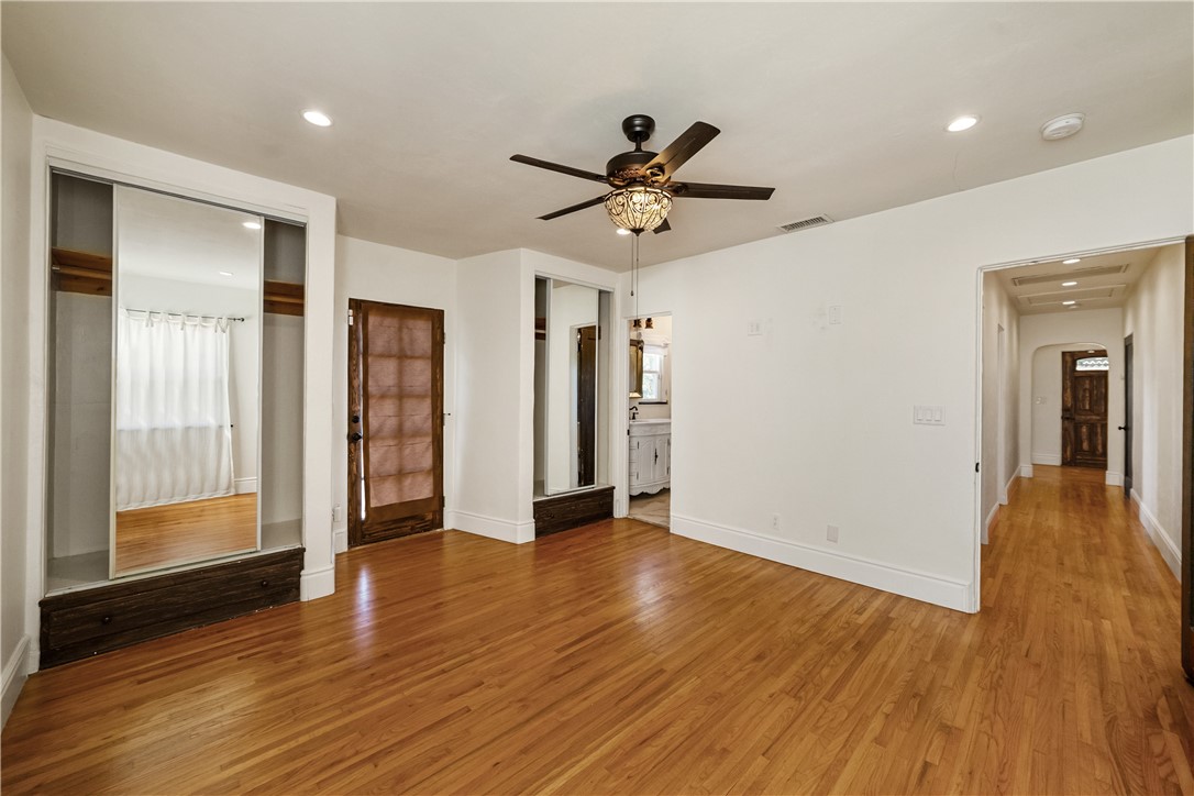 1955 Friendly Drive Vista, CA 92084 - Photo 30 of 75 a view of empty room with wooden floor