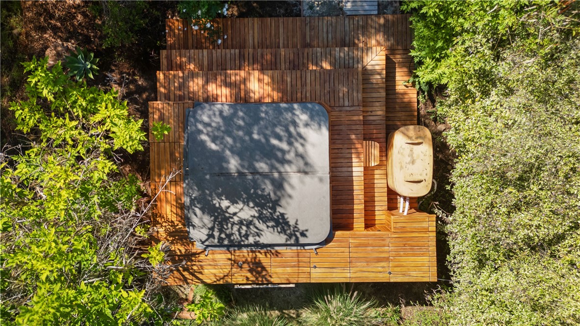 1955 Friendly Drive Vista, CA 92084 - Photo 49 of 75 a view of a brick wall with plants and large trees