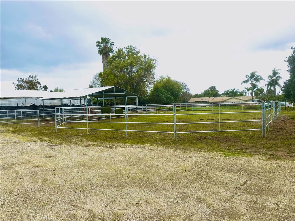 1955 Friendly Drive Vista, CA 92084 - Photo 72 of 75 a view of a swimming pool with an outdoor space and seating area