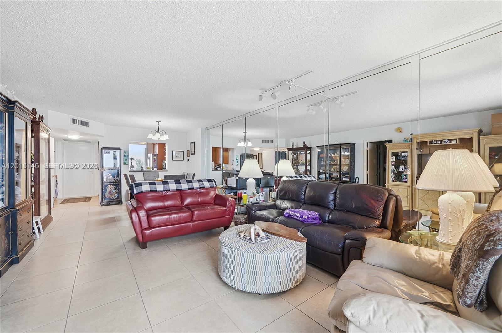 521 North Riverside Drive, Unit 606 Pompano Beach, FL 33062 - Photo 12 of 50 a living room with furniture