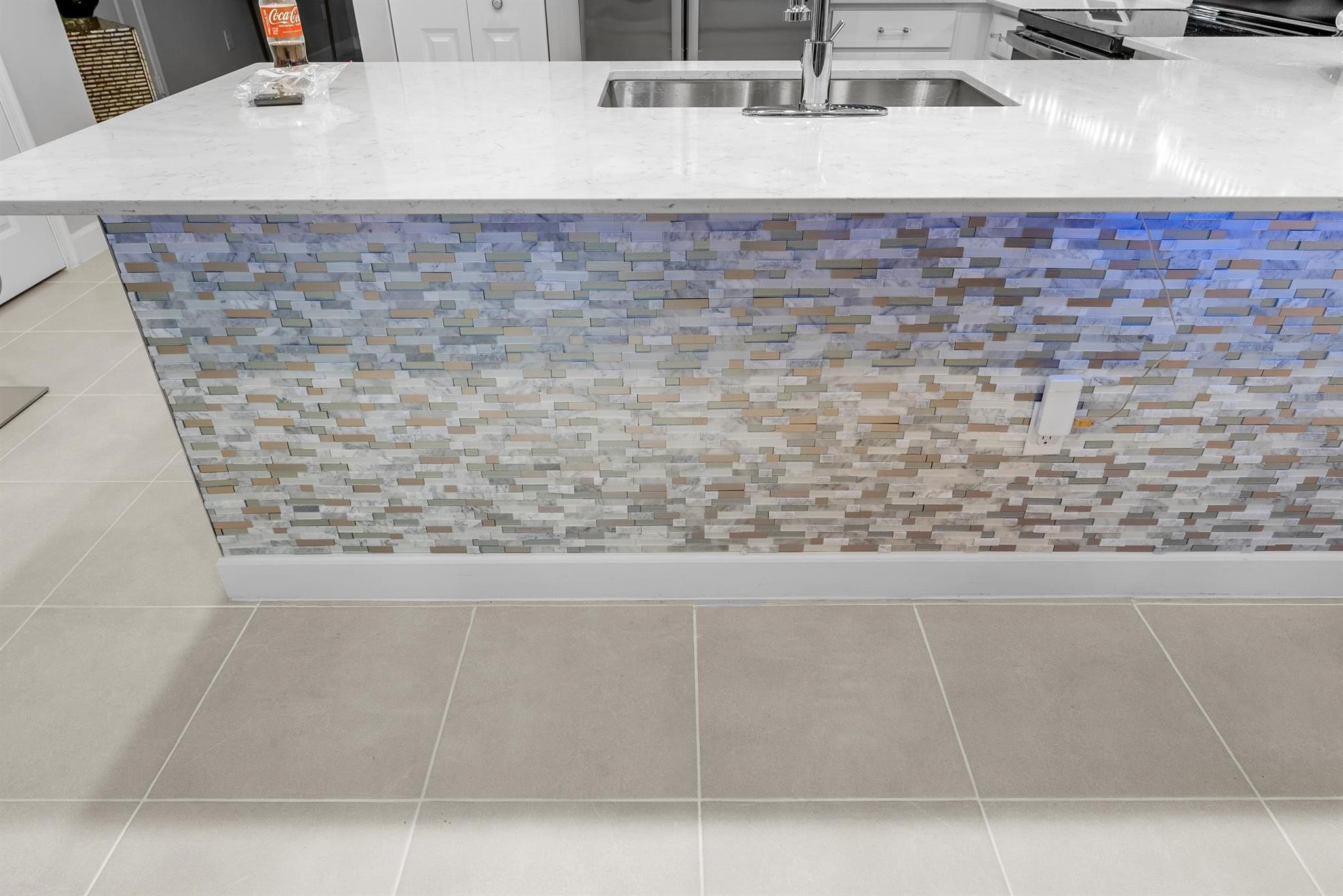 14526 Wiley Range Road, Unit 14526 Delray Beach, FL 33446 - Photo 17 of 52 Custom Tile on Kitchen Bar