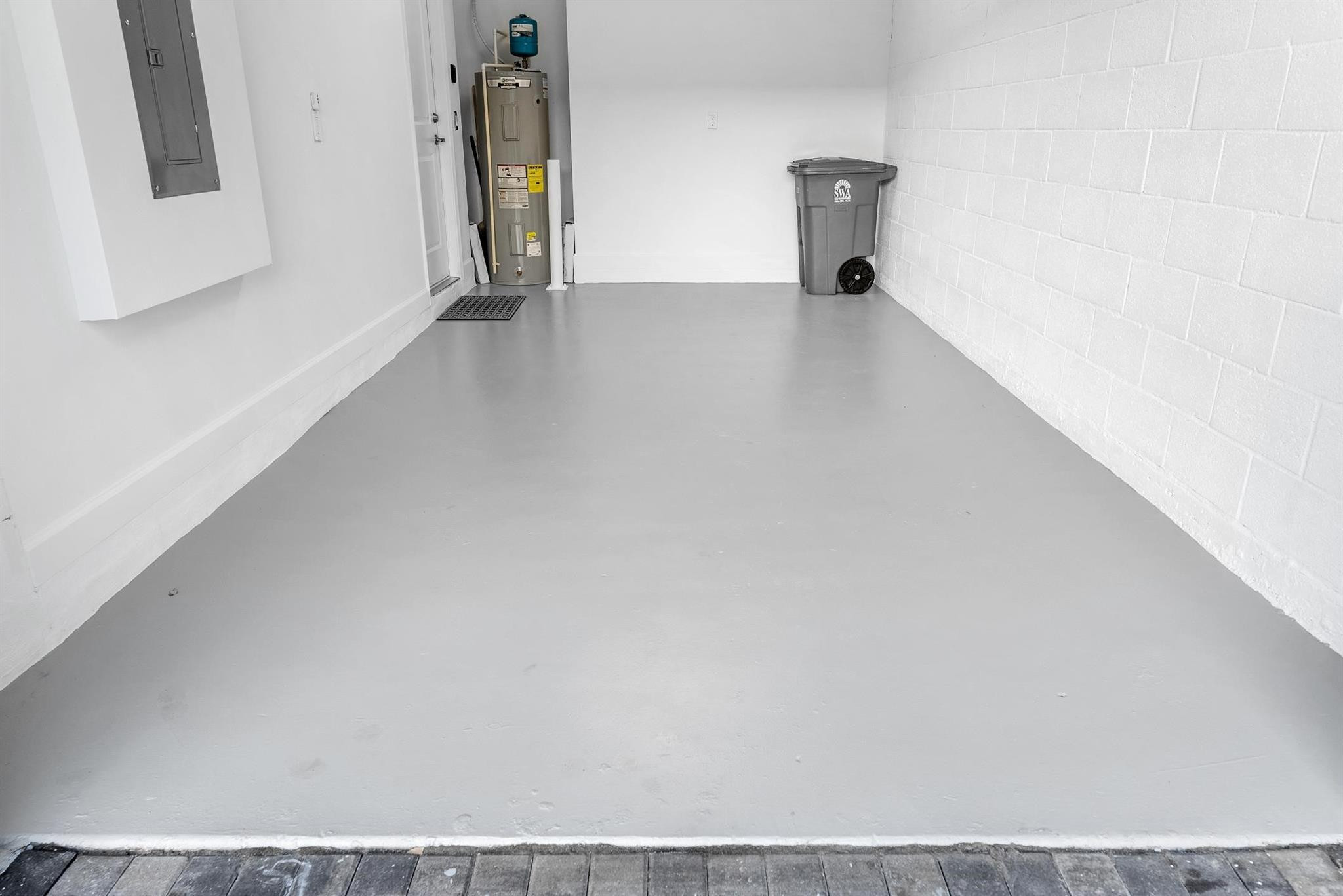14526 Wiley Range Road, Unit 14526 Delray Beach, FL 33446 - Photo 7 of 52 Coated Garage Floor