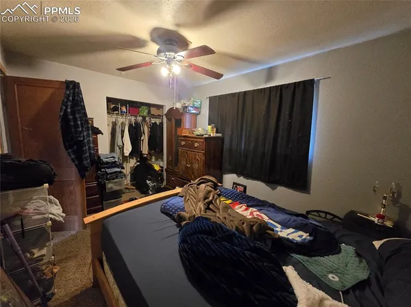 a room with furniture and a flat screen tv