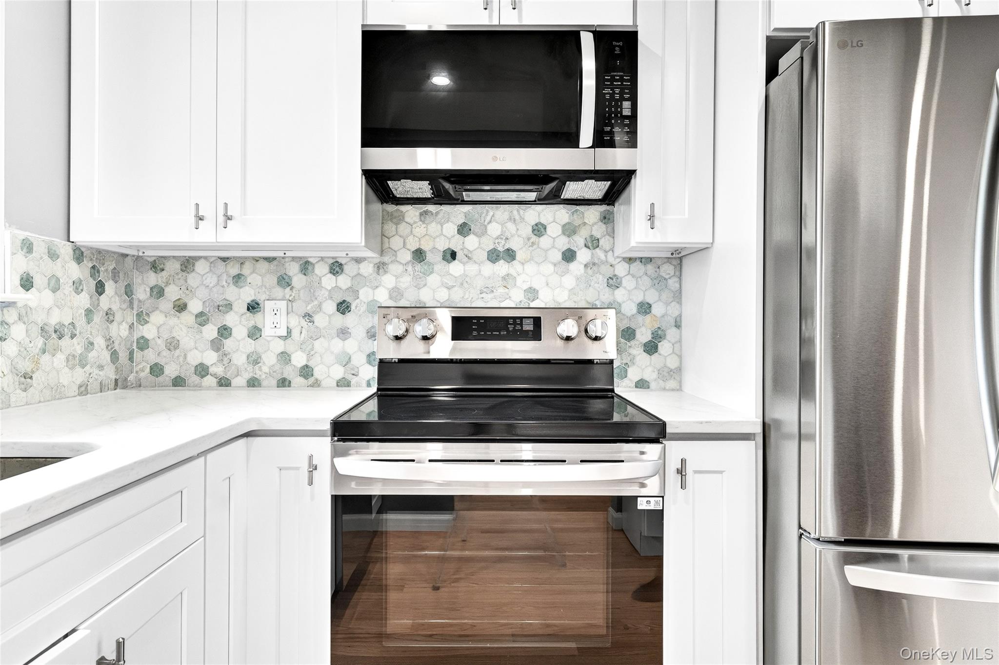 14 Bridle Path Road Ossining, NY 10562 - Photo 15 of 45 a stove top oven sitting inside of a kitchen