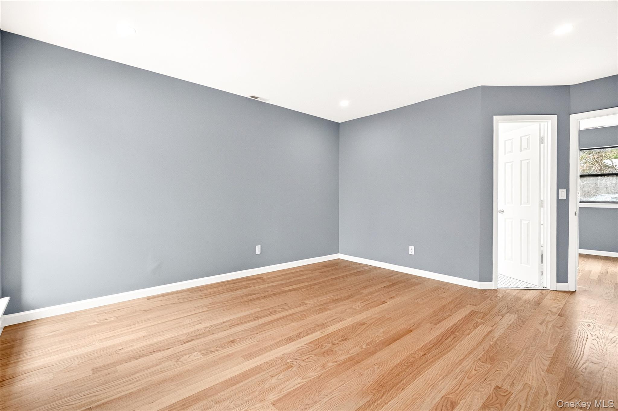 14 Bridle Path Road Ossining, NY 10562 - Photo 22 of 45 a view of an empty room with wooden floor