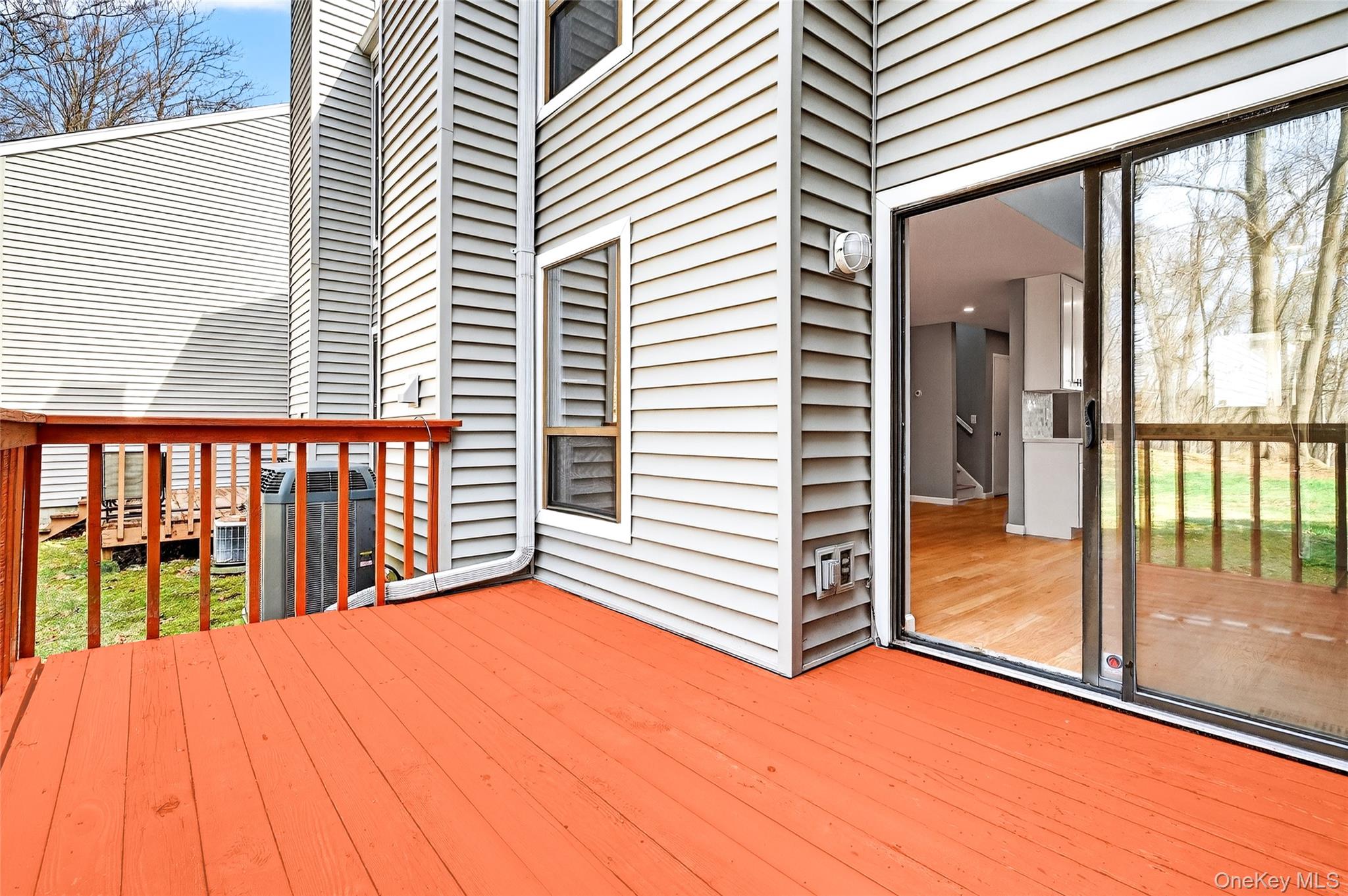 14 Bridle Path Road Ossining, NY 10562 - Photo 40 of 45 a view of a porch with a floor to ceiling window and wooden floor