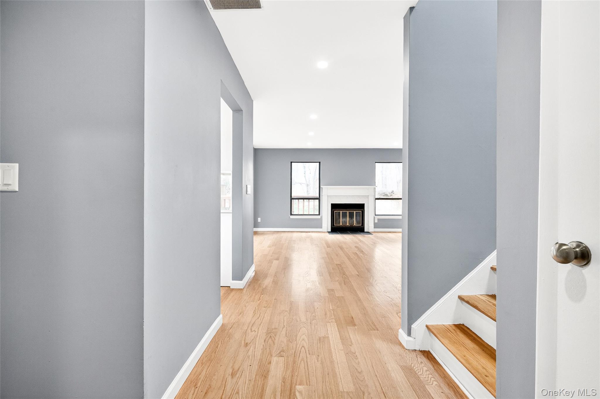 14 Bridle Path Road Ossining, NY 10562 - Photo 5 of 45 a view of empty room with wooden floor and window