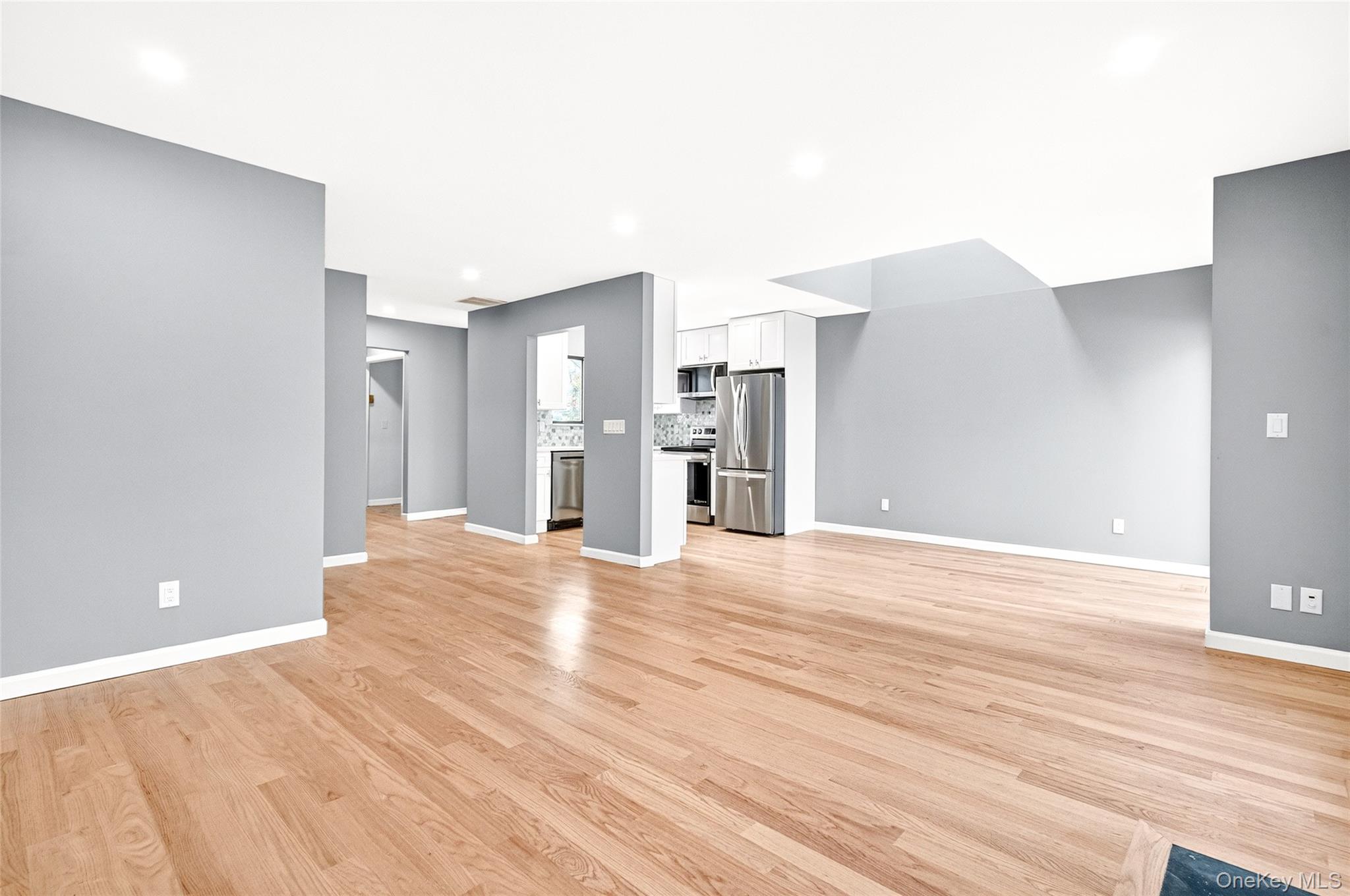 14 Bridle Path Road Ossining, NY 10562 - Photo 9 of 45 a view of a livingroom with a kitchen and a window