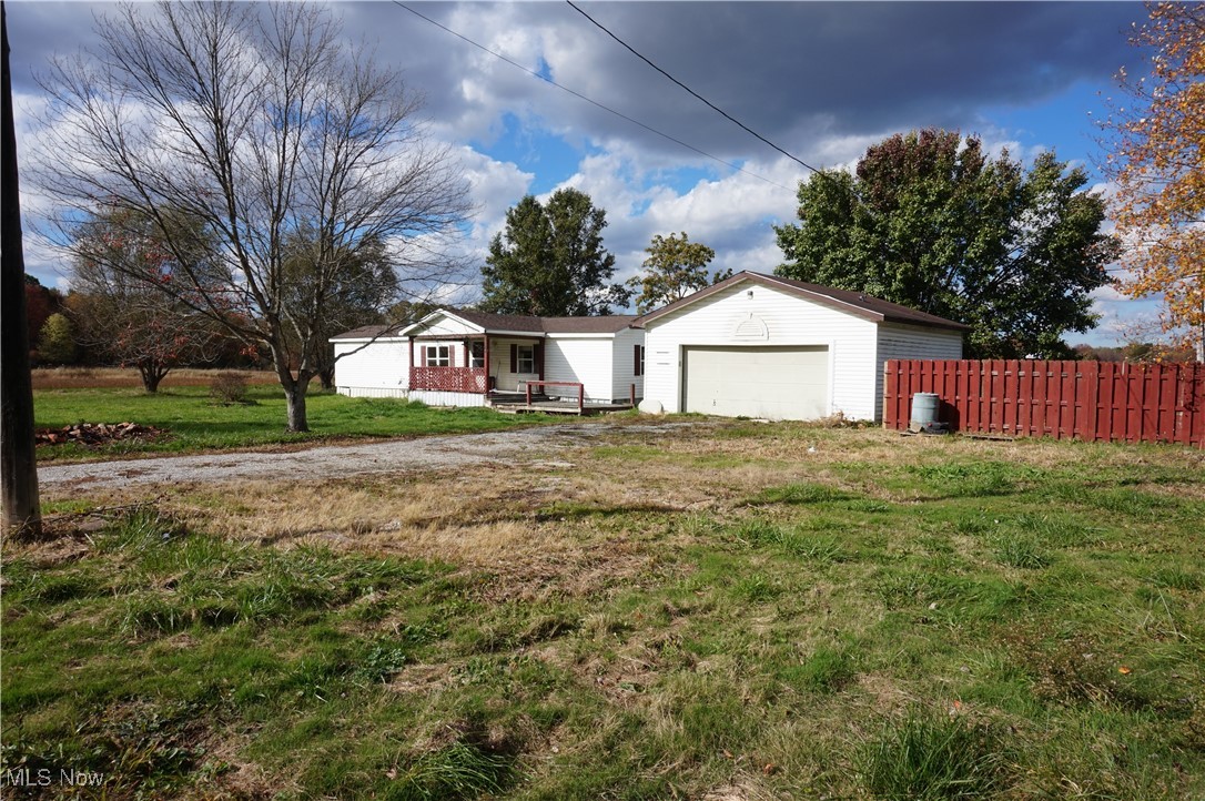 1301 Highway 6 Rome, OH 44085 - Photo 2 of 13 Garage and front of house