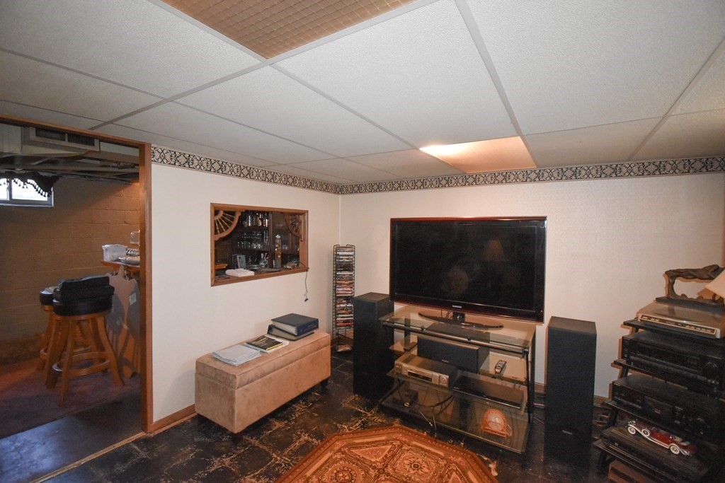276 Oak Street Springfield, MA 01151 - Photo 24 of 36 a living room with furniture and a flat screen tv