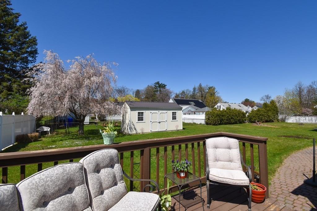 276 Oak Street Springfield, MA 01151 - Photo 29 of 36 a balcony with wooden floor table and chairs