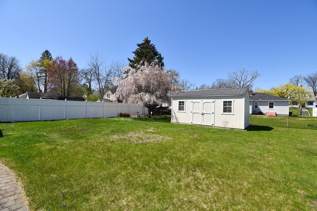 276 Oak Street Springfield, MA 01151 - Photo 31 of 36 a view of a house with a back yard