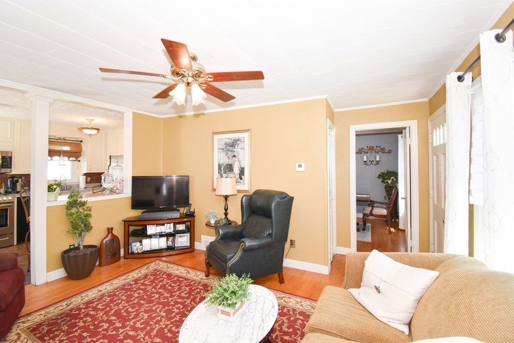276 Oak Street Springfield, MA 01151 - Photo 9 of 36 a living room with furniture and a flat screen tv