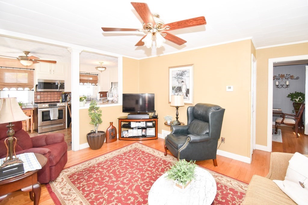 276 Oak Street Springfield, MA 01151 - Photo 10 of 36 a living room with furniture and a flat screen tv