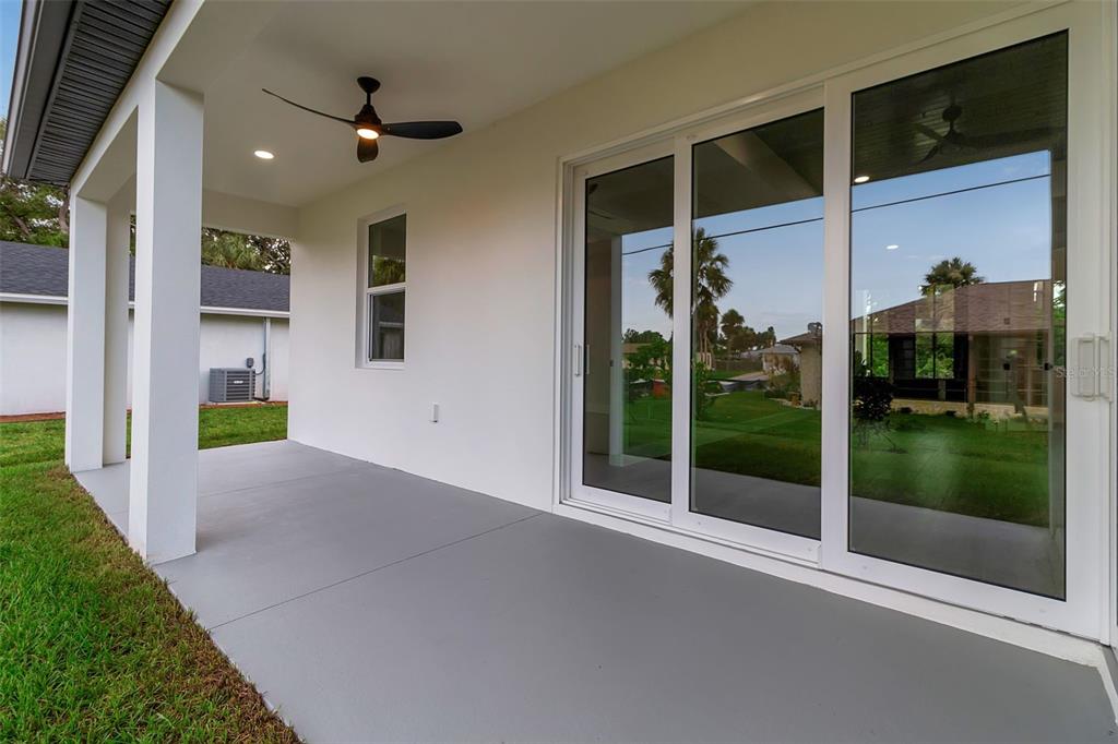 776 Cypress Road Venice, FL 34293 - Photo 13 of 89 a view of a house with a backyard and porch