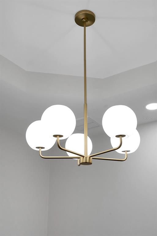 776 Cypress Road Venice, FL 34293 - Photo 50 of 89 a picture of a room with a sink and a mirror