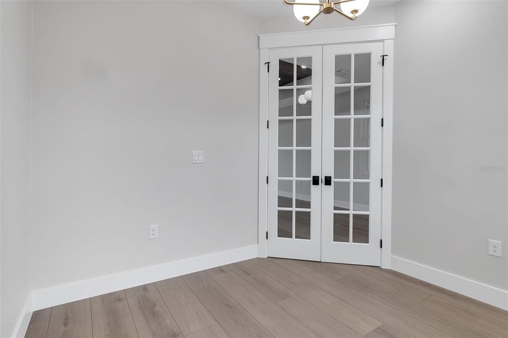 776 Cypress Road Venice, FL 34293 - Photo 51 of 89 an empty room with windows