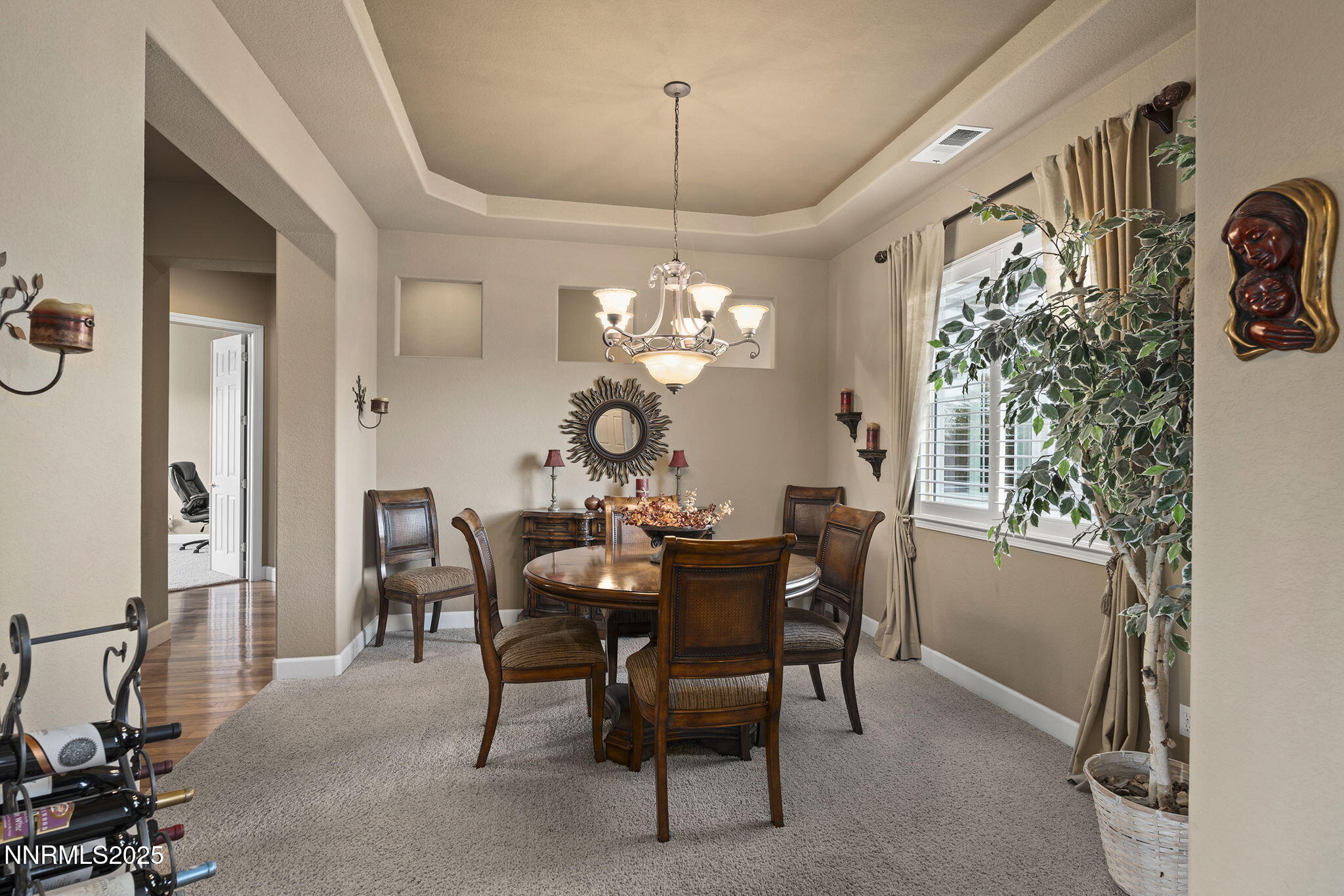 2757 Robb Drive Reno, NV 89523 - Photo 14 of 51 a view of a dining room with furniture and chandelier