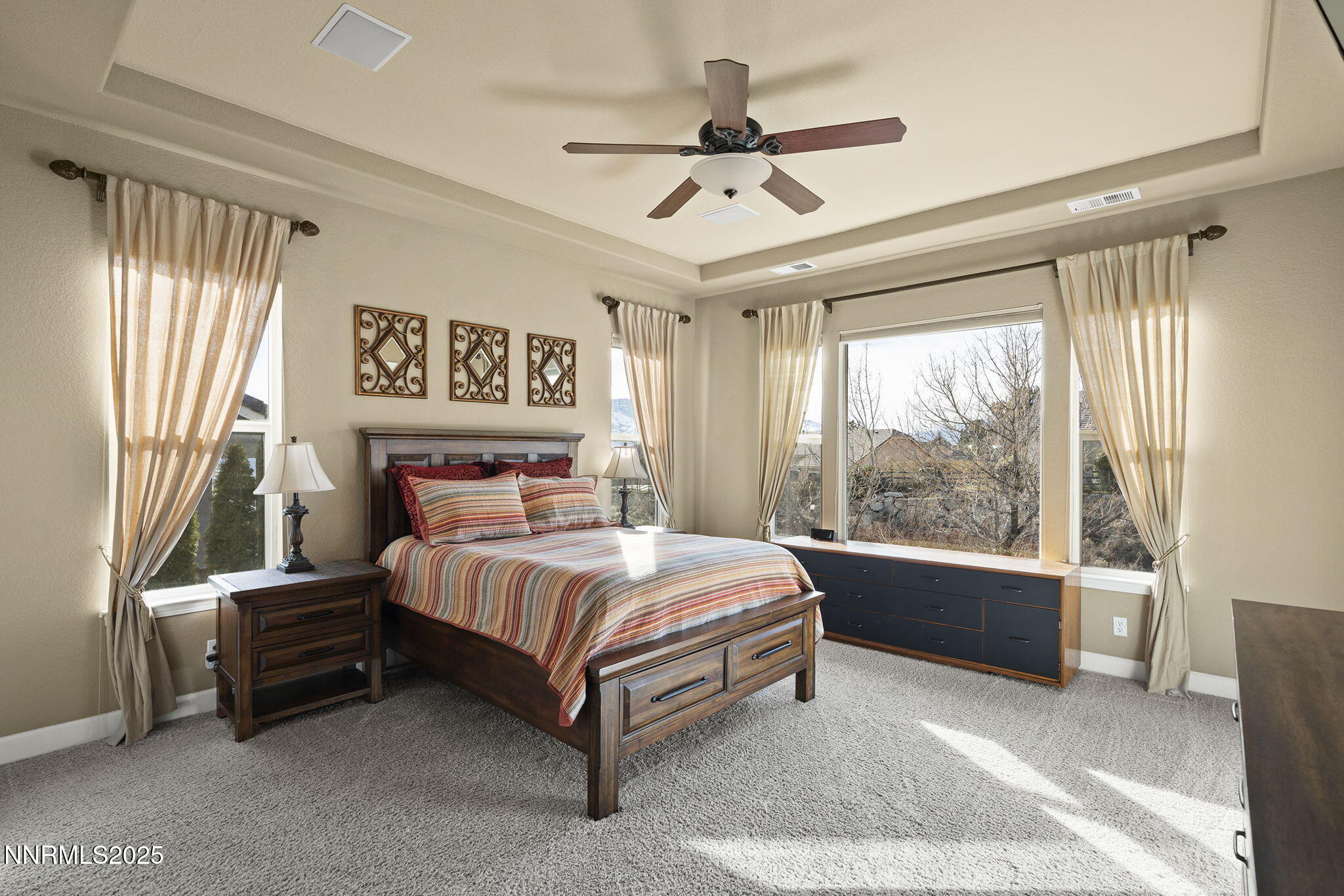 2757 Robb Drive Reno, NV 89523 - Photo 15 of 51 a bed sitting in a spacious bedroom next to a window