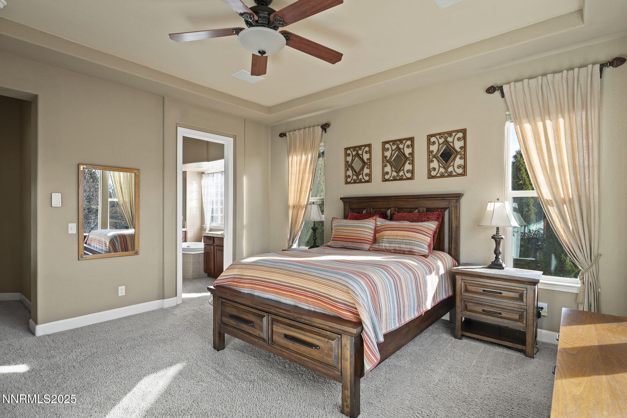 2757 Robb Drive Reno, NV 89523 - Photo 17 of 51 a spacious bedroom with a bed and window