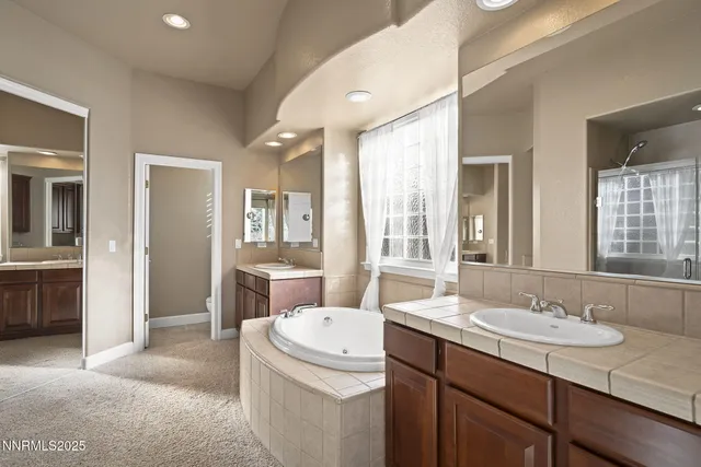 a bathroom with a toilet a sink and a bathtub