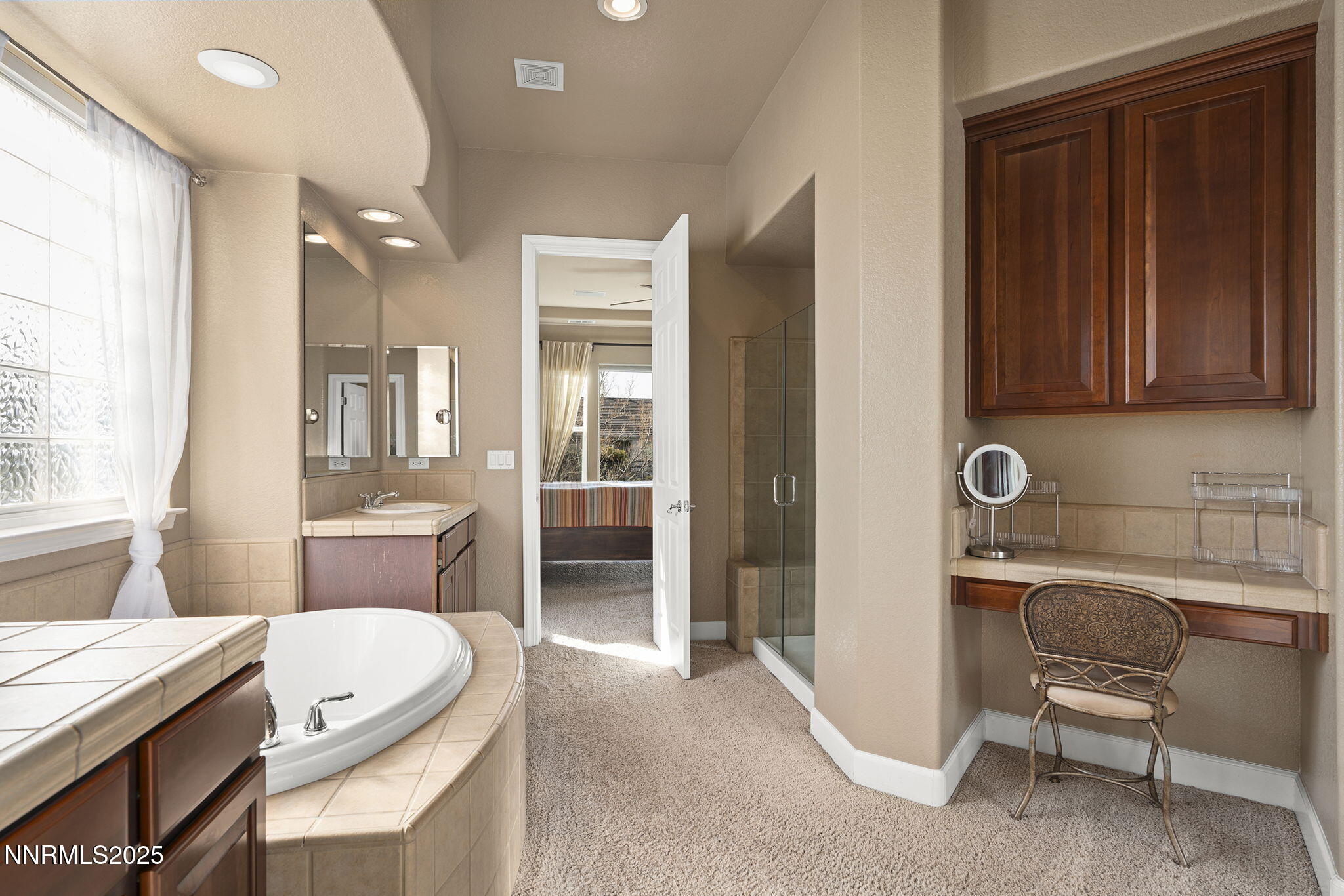 2757 Robb Drive Reno, NV 89523 - Photo 19 of 51 a bathroom with a toilet a sink and a bathtub