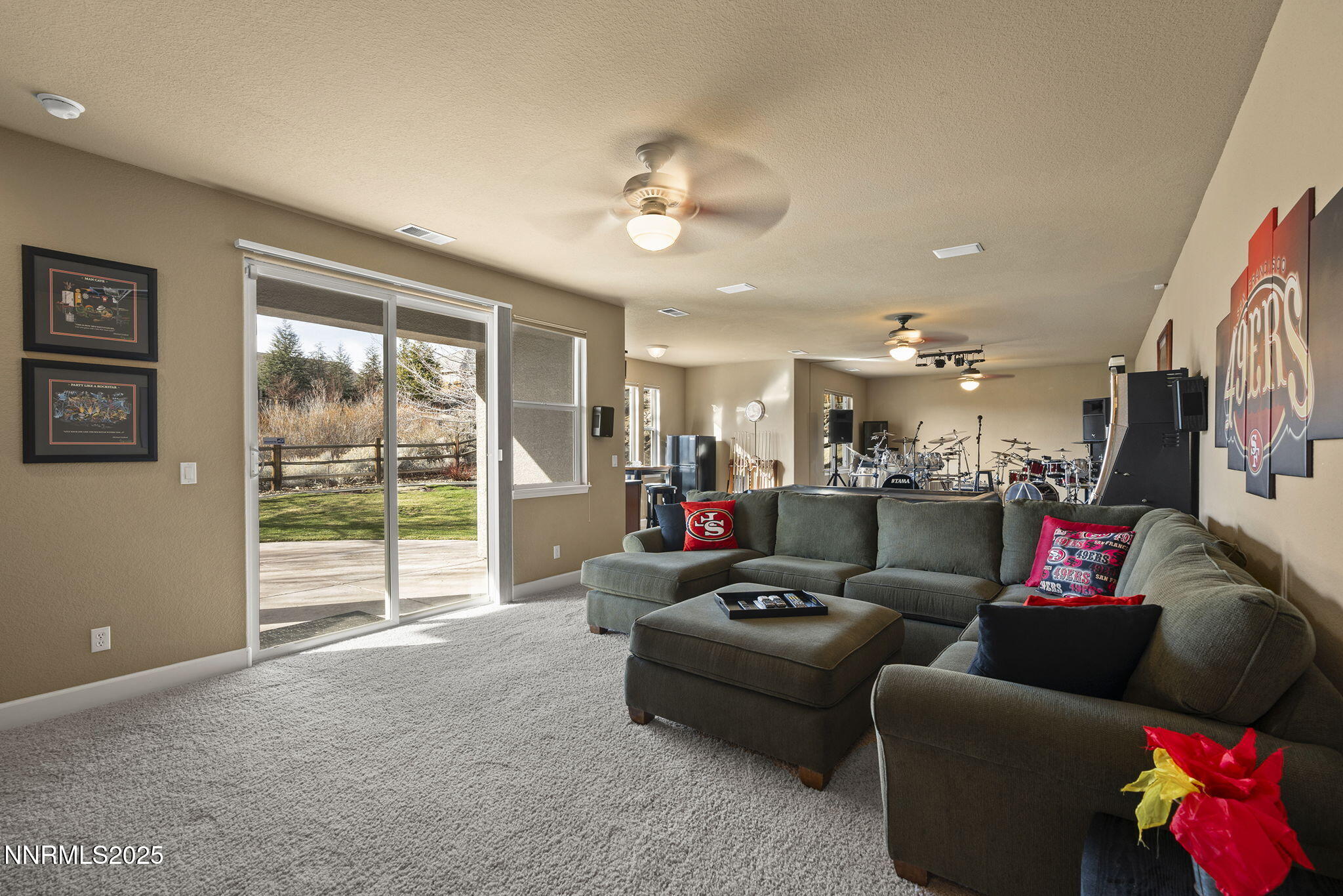 2757 Robb Drive Reno, NV 89523 - Photo 29 of 51 a living room with furniture and a floor to ceiling window