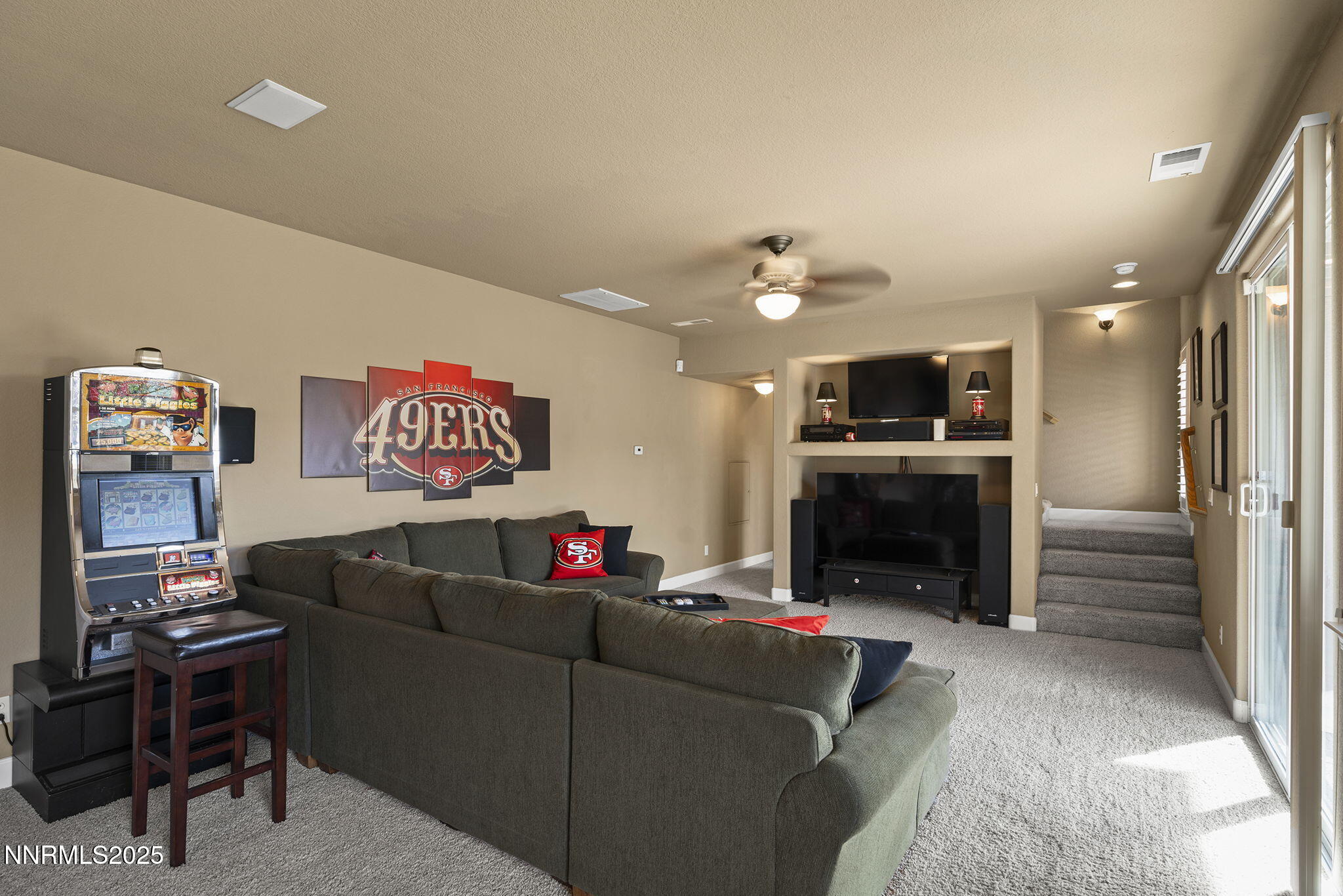 2757 Robb Drive Reno, NV 89523 - Photo 31 of 51 a living room with furniture and a flat screen tv