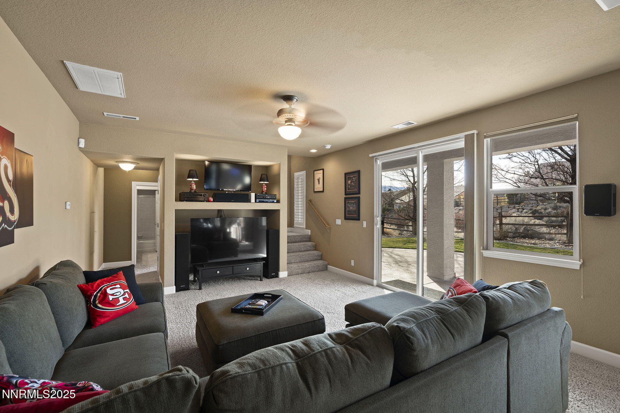 2757 Robb Drive Reno, NV 89523 - Photo 32 of 51 a living room with furniture and a flat screen tv