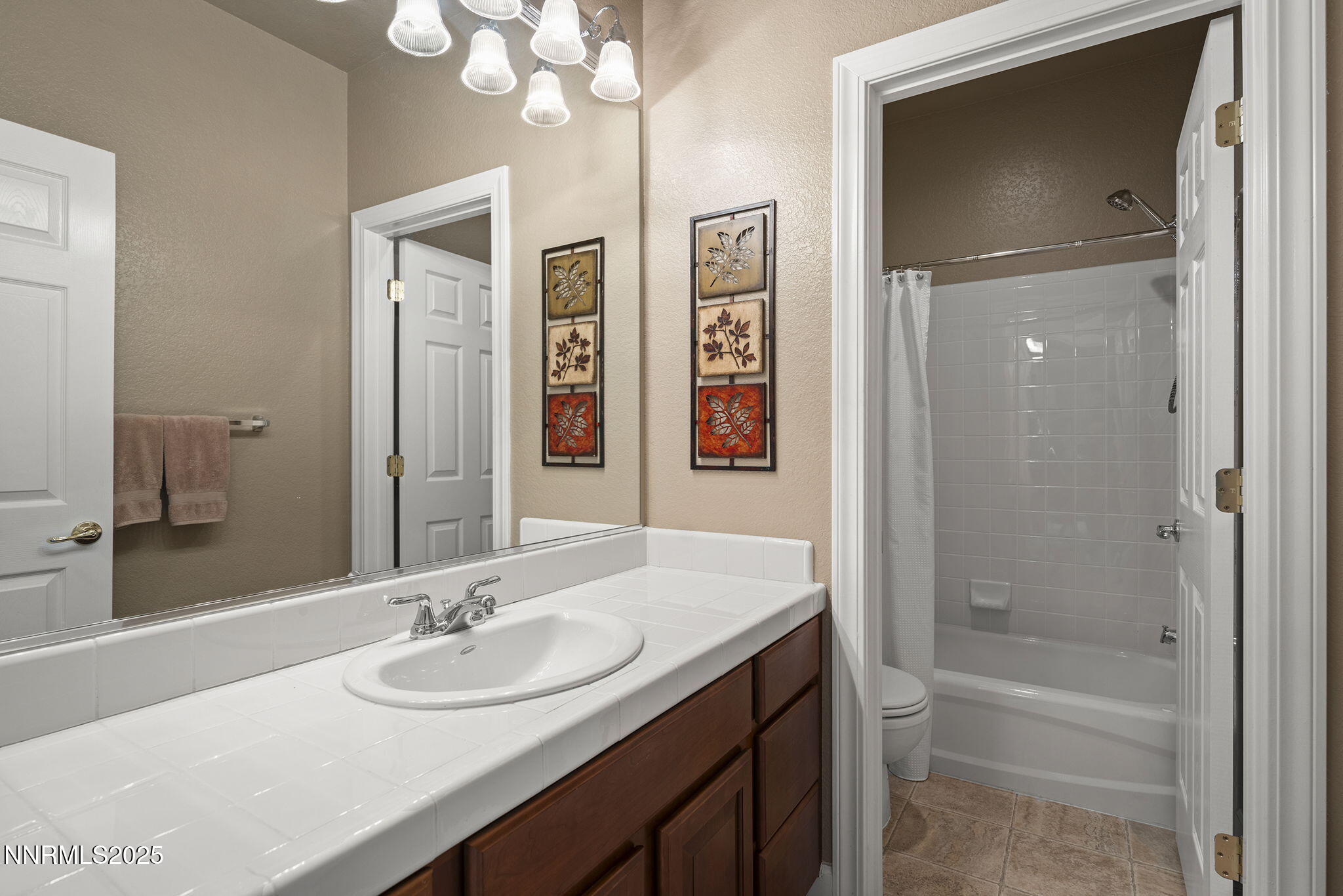 2757 Robb Drive Reno, NV 89523 - Photo 38 of 51 a bathroom with a sink double vanity granite tub and a mirror