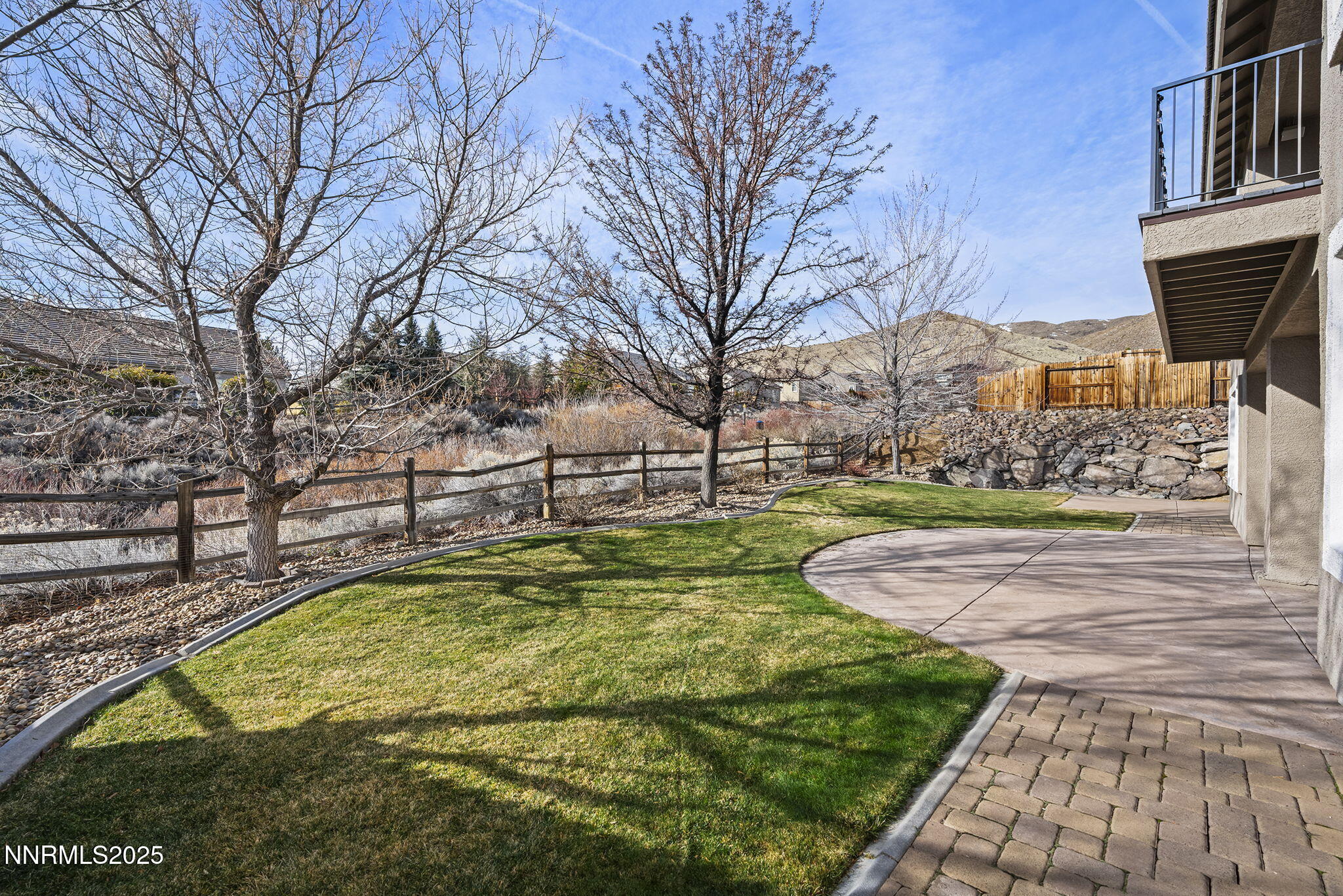 2757 Robb Drive Reno, NV 89523 - Photo 39 of 51 a view of yard with swimming pool and trees