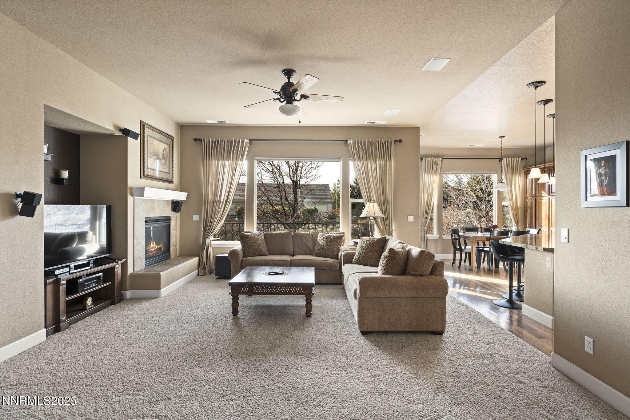 2757 Robb Drive Reno, NV 89523 - Photo 4 of 51 a living room with furniture and a flat screen tv