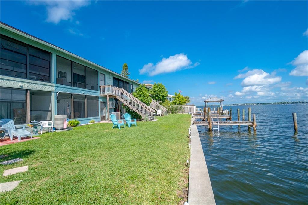 5041 North Beach Road, Unit 3A Englewood, FL 34223 - Photo 39 of 52 a view of a house with a patio