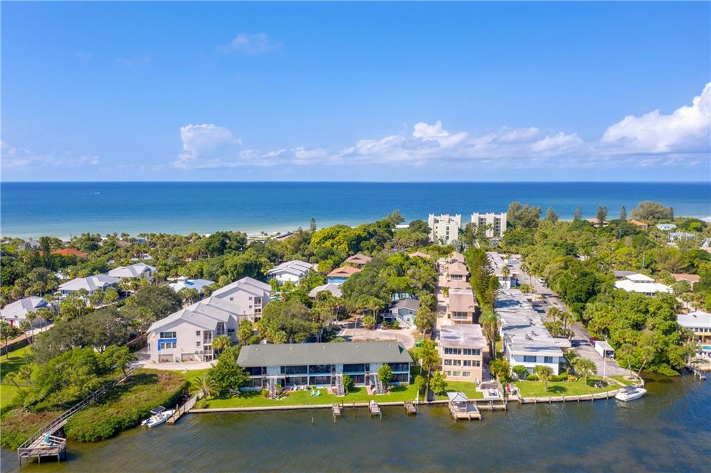 5041 North Beach Road, Unit 3A Englewood, FL 34223 - Photo 42 of 52 an aerial view of residential houses with outdoor space