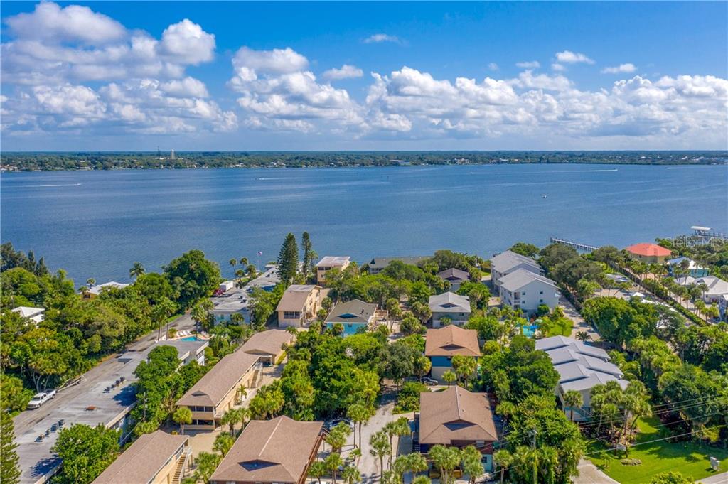 5041 North Beach Road, Unit 3A Englewood, FL 34223 - Photo 50 of 52 an aerial view of a houses with outdoor space
