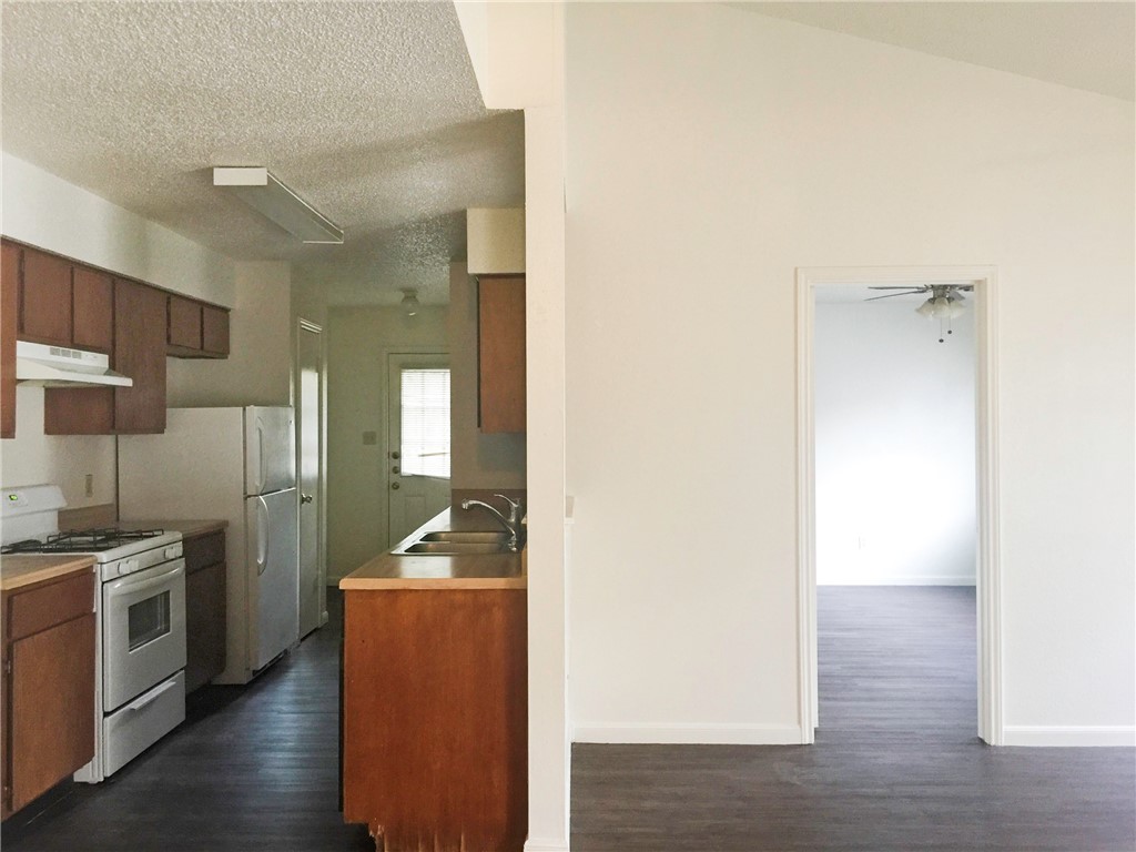2014 Alex Avenue, Unit B Austin, TX 78728 - Photo 9 of 18 Kitchen/Living Room to Primary Bedroom