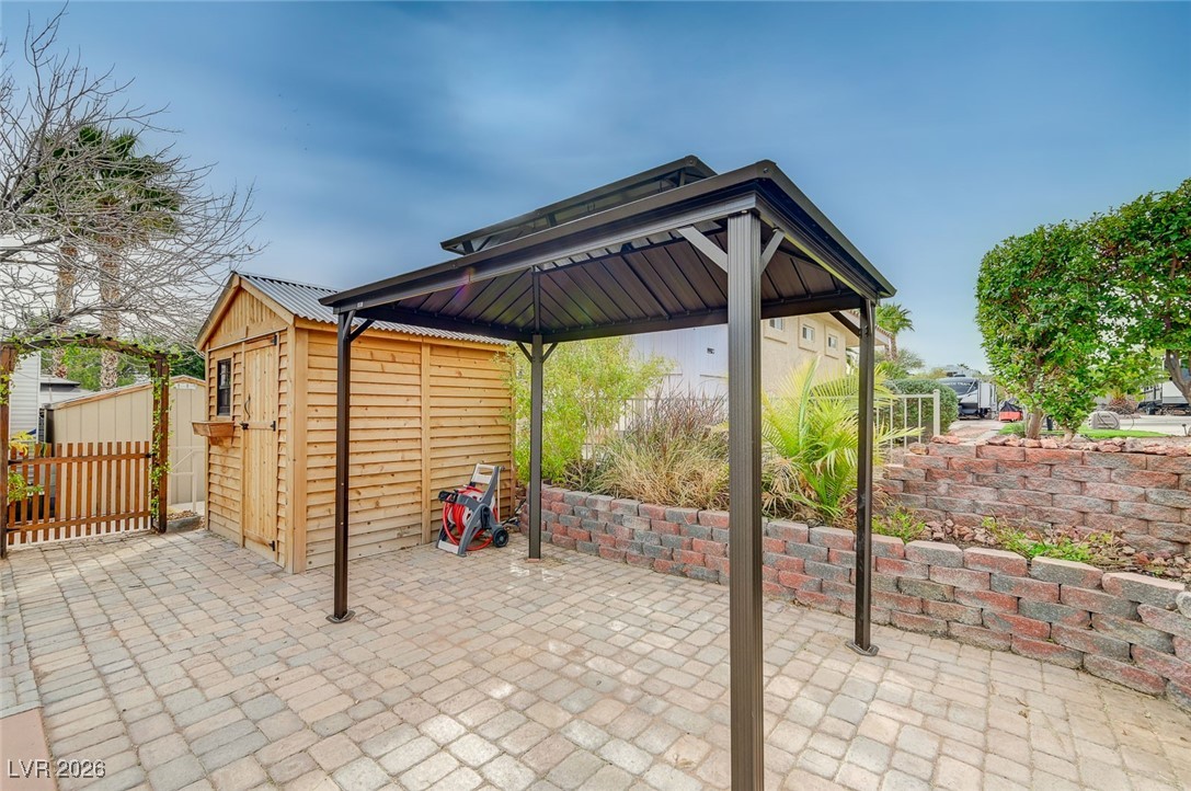866 Sparrow Way Boulder City, NV 89005 - Photo 21 of 25 View of patio / terrace with a gazebo and a storage unit