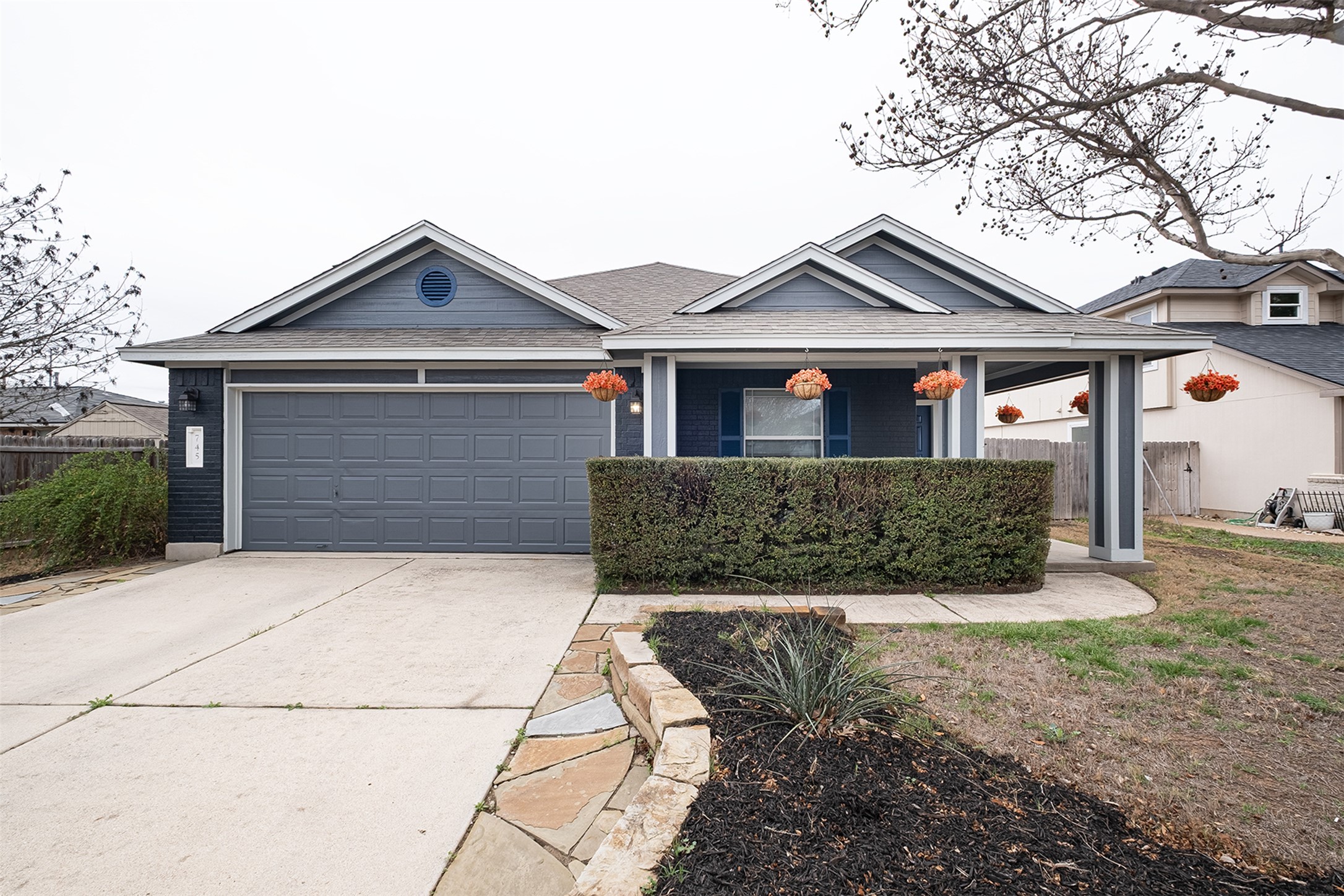 a front view of a house with yard
