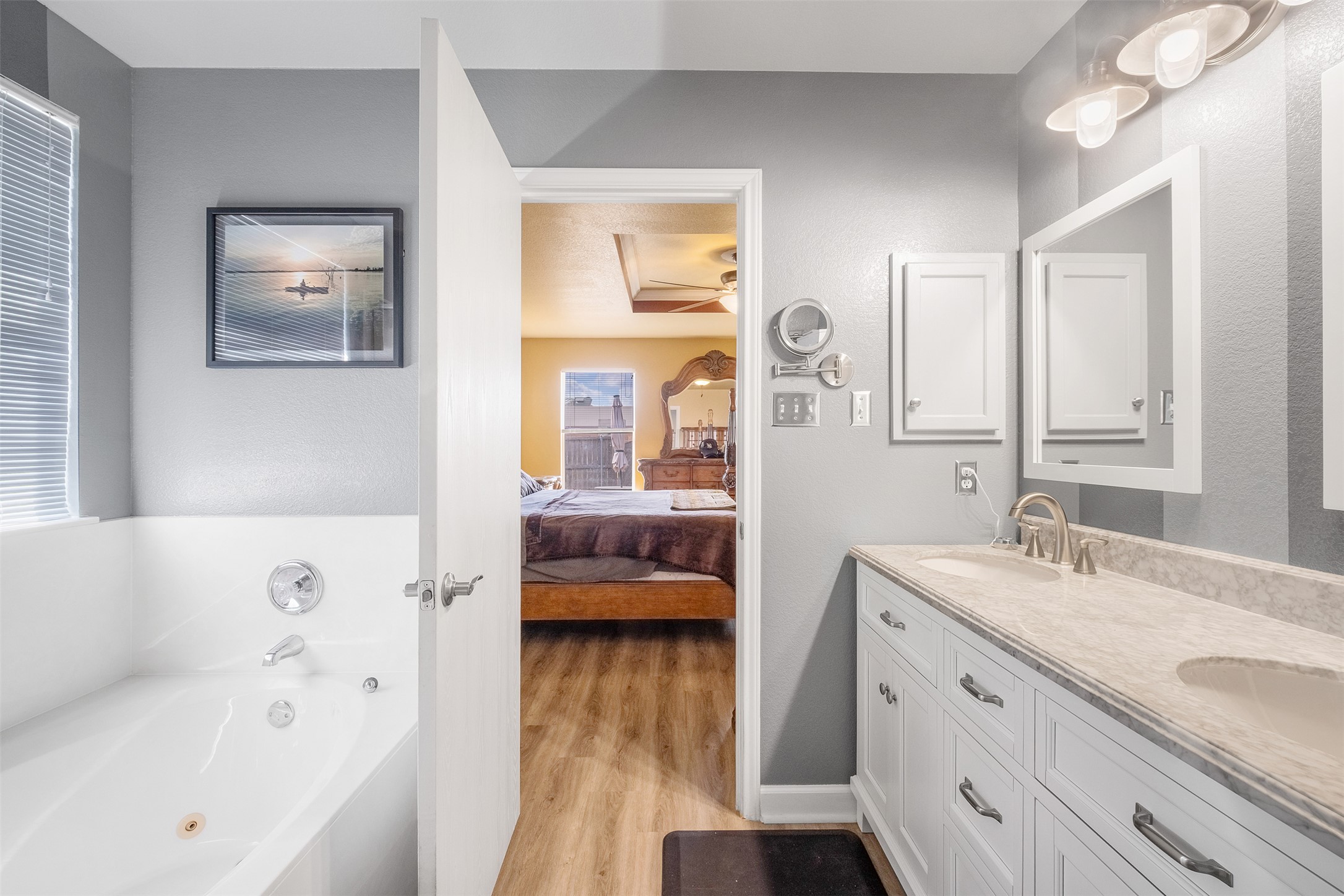 745 Caylor Cove Bastrop, TX 78602 - Photo 24 of 40 This primary bathroom features a relaxing soaking tub, perfect for unwinding after a long day. Combined with updated finishes and a spacious layout, it creates a serene retreat within the home. Ideal for buyers searching for a Bastrop home for sale with a luxurious primary bathroom, this space blends comfort and style effortlessly.